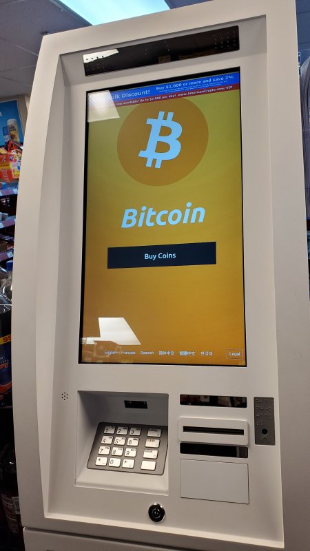 Walmart allowing some shoppers to buy bitcoin at Coinstar kiosks | Reuters