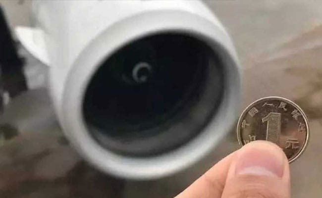 Coins thrown into plane engine by elderly lady for good luck cause delay in China - ABC News