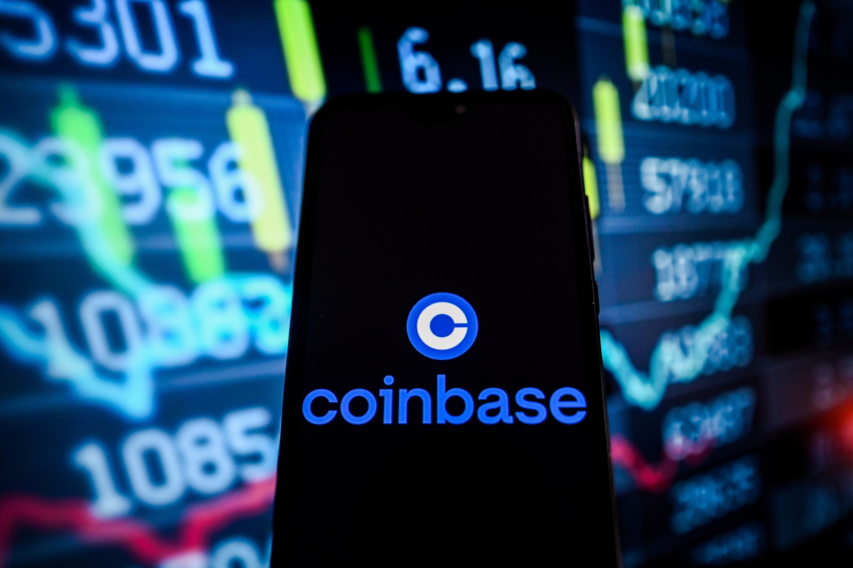 Coinbase trading volumes fall as exchange posts seventh consecutive quarterly loss