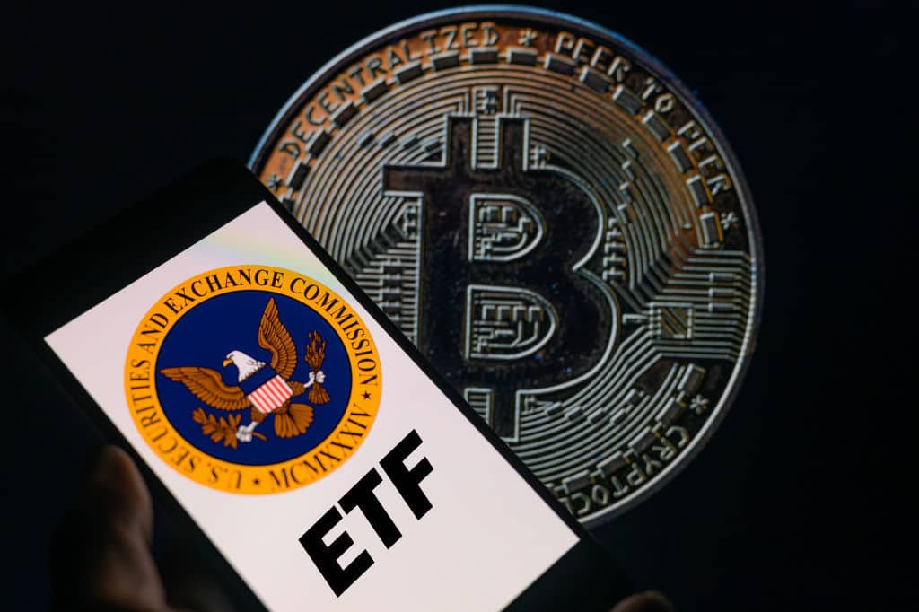 FACTBOX Spot bitcoin ETF issuers compete on fees for market share | Reuters