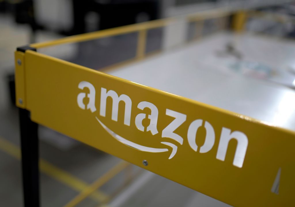 Amazon denies report of accepting bitcoin as payment | Reuters